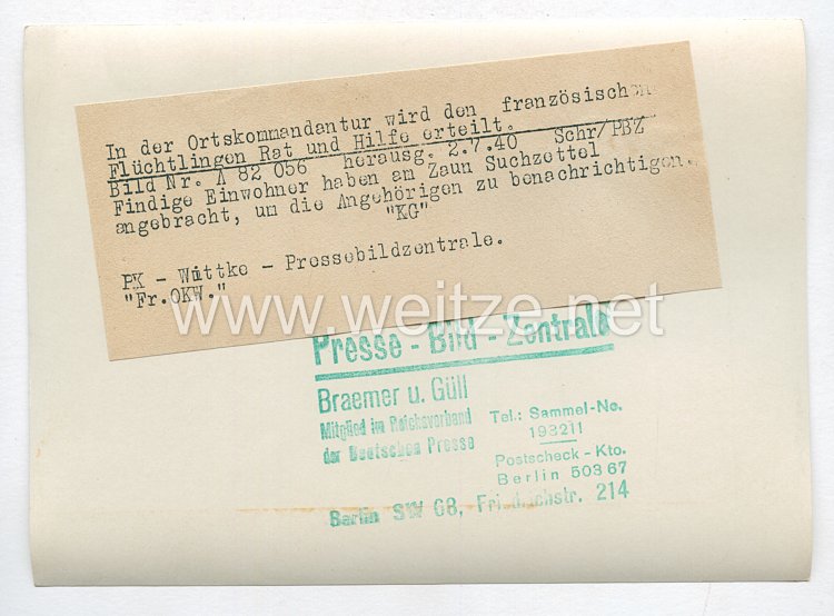 3. Reich Pressefoto: In der Ortskommandanten wird den französischen Flüchtlingen Rat und Hilfe erteilt. 2.7.1940 Bild 2